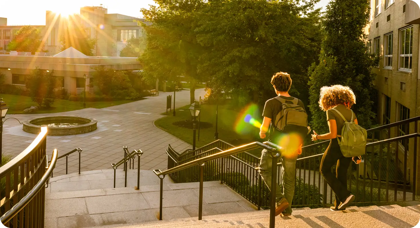 University students walking down stairs in their campus