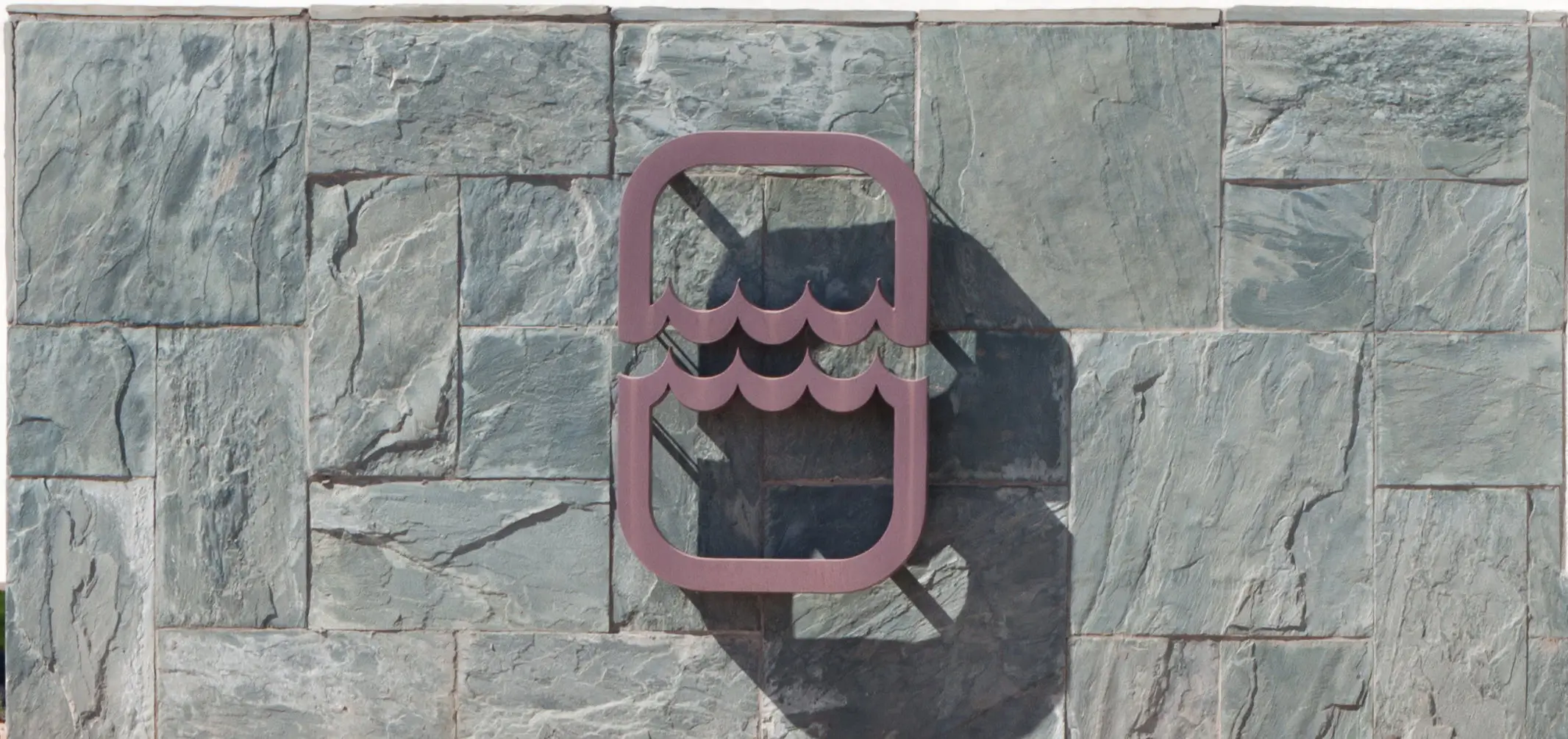 Las Vegas Valley water district logo on brick wall