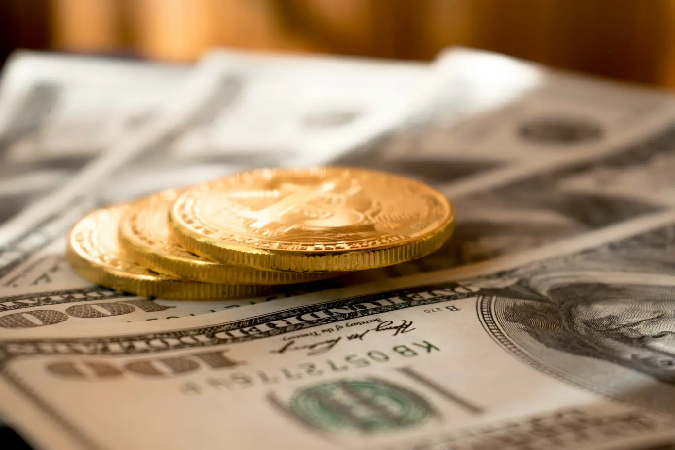 US currency with gold eagles on top