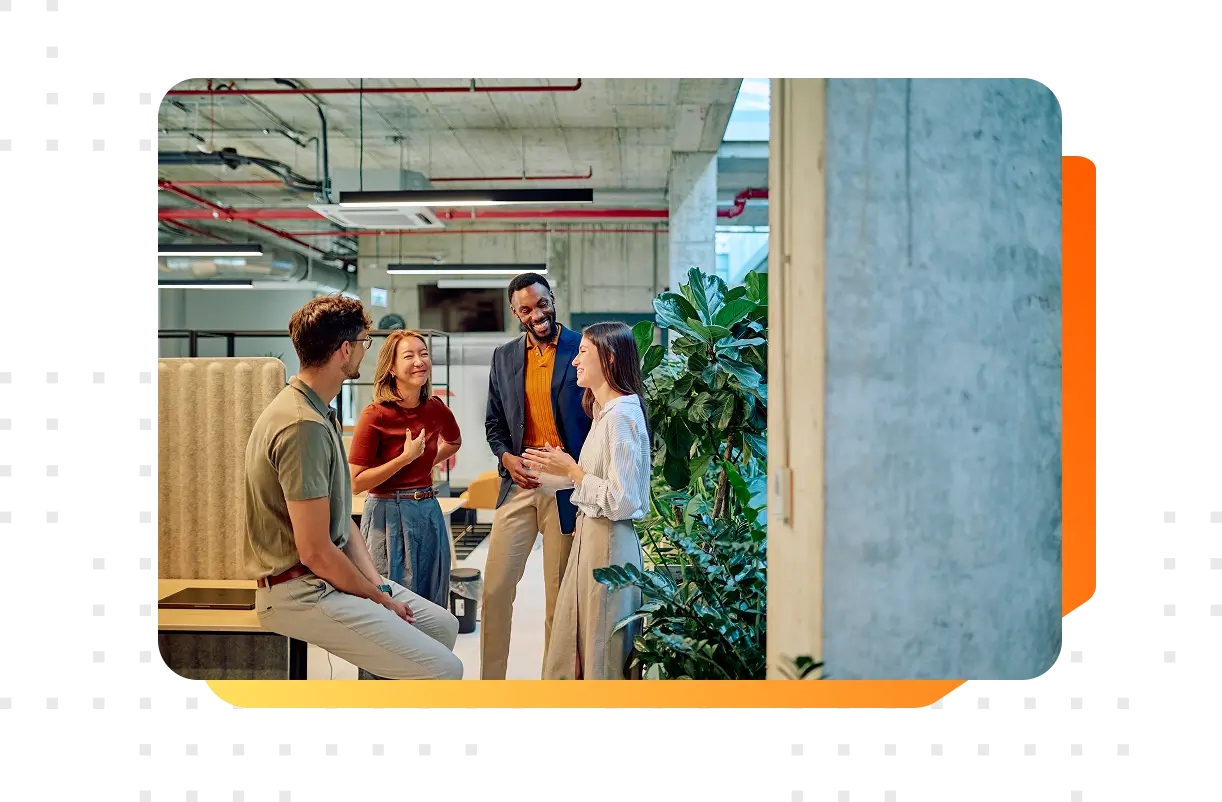 A procurement team in an office setting in a team discussion